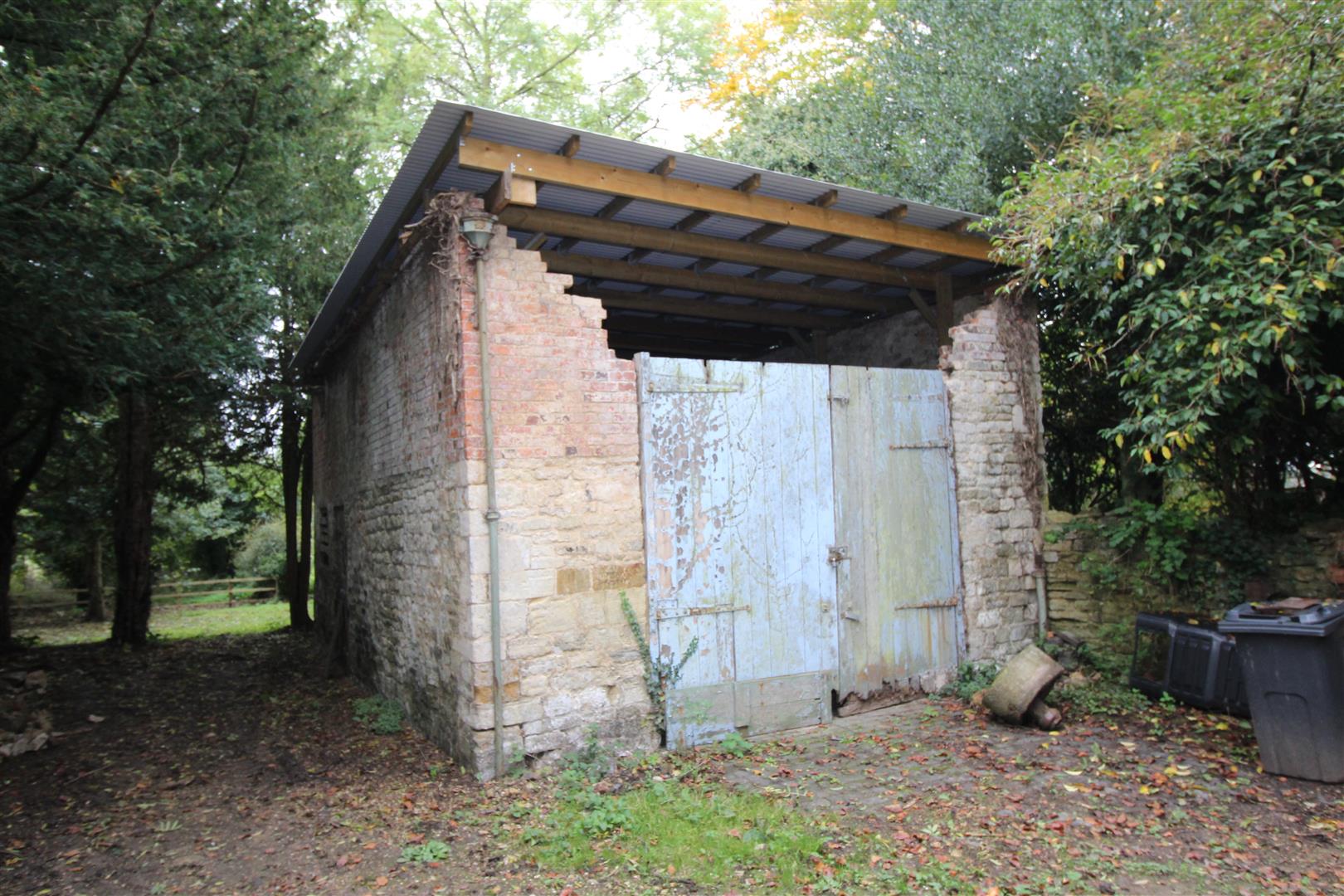RESIDENTIAL DEVELOPMENT SITE - Rarely available opportunity to acquire this residential Grade 2 listed stone stable and barn outbuildings development site located in the most private of locations with wonderful views adjacent to a renovated Manor House. P